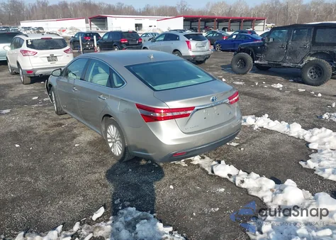 2013 Toyota Avalon Hybrid Limited z USA, uszkodzony, nr VIN 4T1BD1EB1DU004386